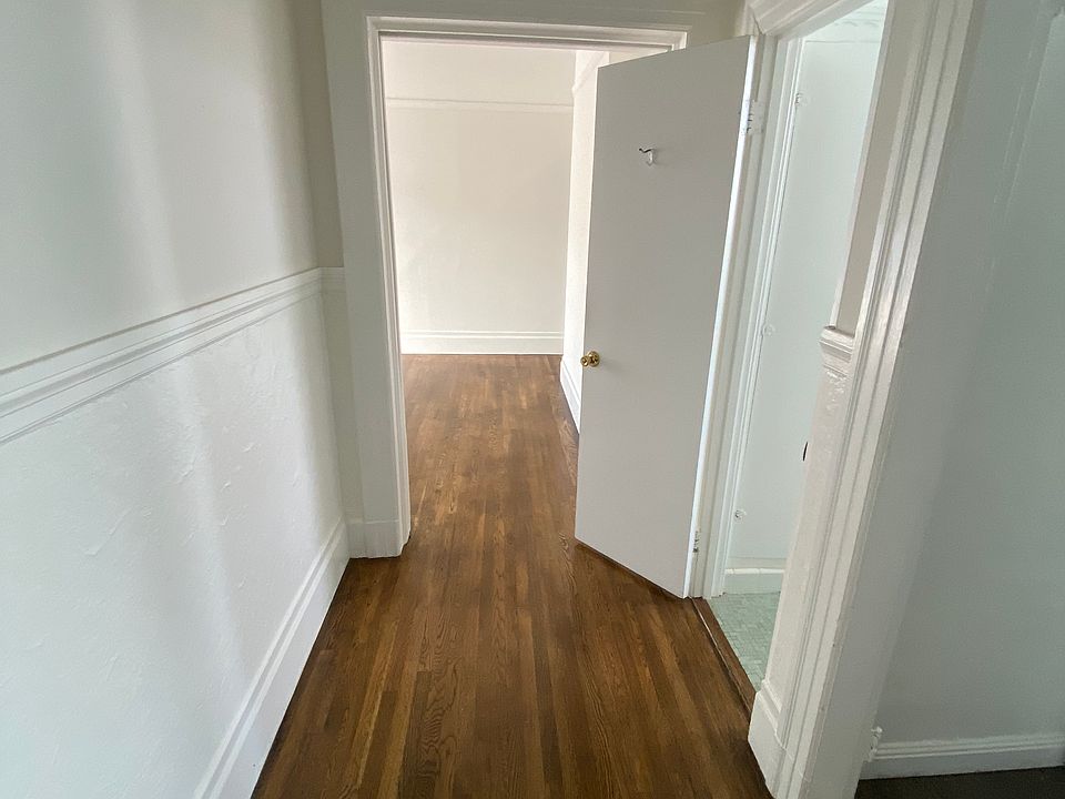 Hall entrance looking into Living / Dining room
