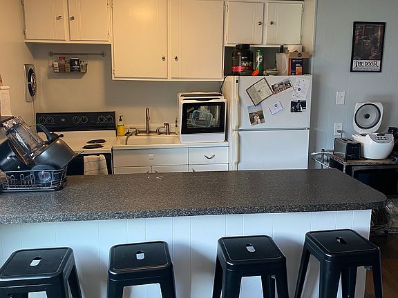Kitchen with island prep space