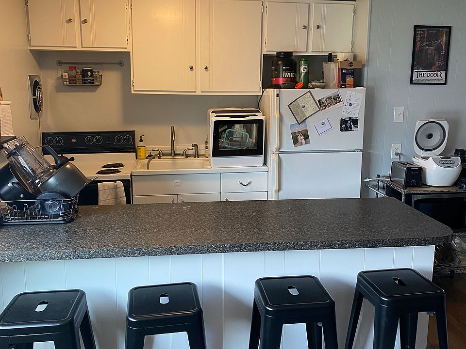 Kitchen with island prep space