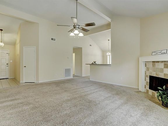 From the back of the room you can see the entry way, hall closet, breakfast room and the door to secondary bedrooms. The floorplan flows for modern living.