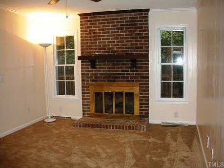 Comfortable family room features gas fireplace