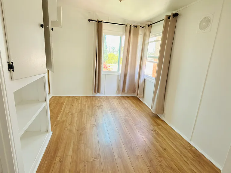 Bedroom with large closet and lots of natural light