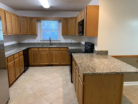 Ample cabinets and new granite counter tops