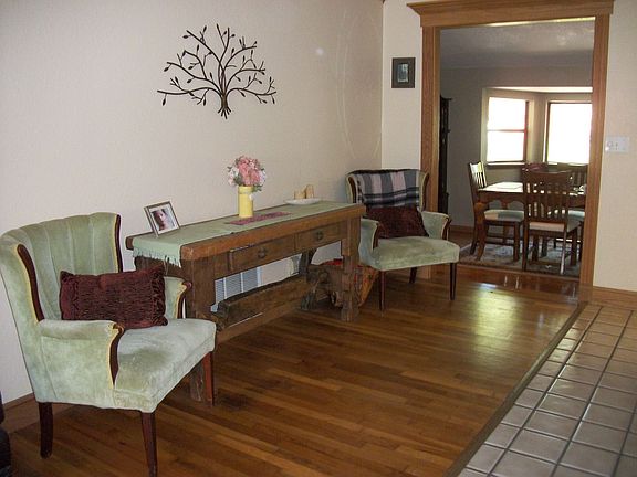 Open floor plan features lovely hardwood floors