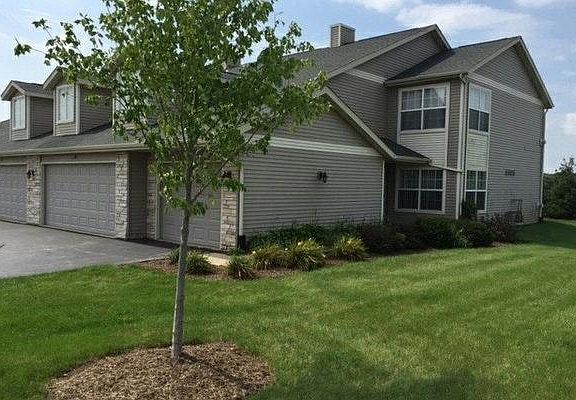 A lovely home in a quiet neighborhood with big green lawns and huge common areas for dog walking or kids playing!