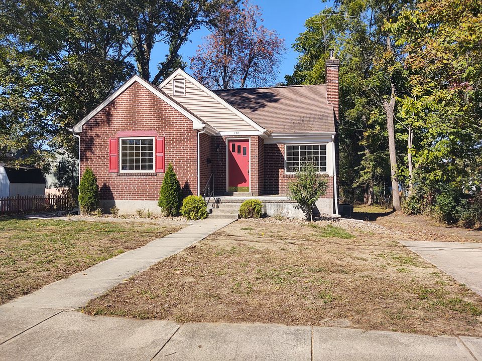 Exterior of house. New porch rail will be added before move in