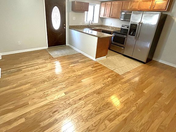 Living Room 
Beautiful hardwood flooring 
Private entrance to apartment 
Open layout