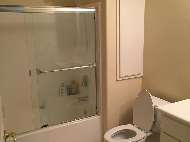 First bathroom with bathtub