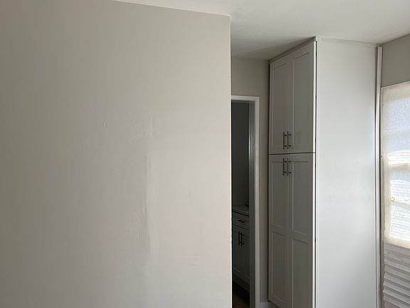 View from Living Space and photo of the Wardrobe and entry to the Kitchen