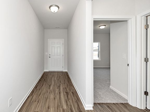 The Avery- Extended Foyer. Sample image for illustration upgrades, options, and colors may vary.