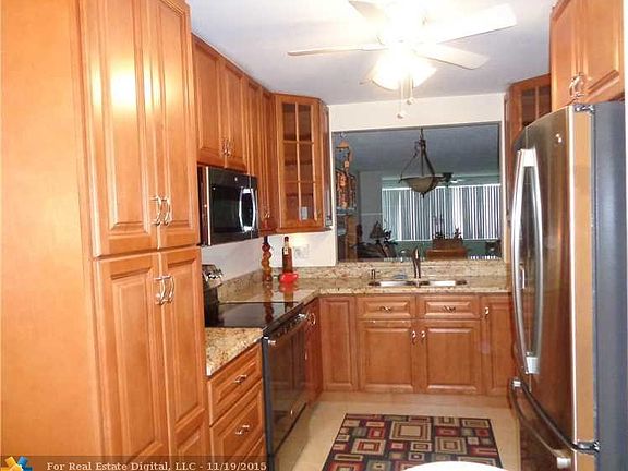 2nd image of 9643 N Belfort Cir #105