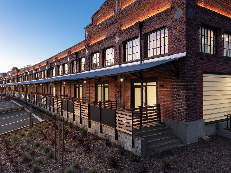 Twilight exterior of Star Harbor Apartments & Townhomes in Alameda, CA.