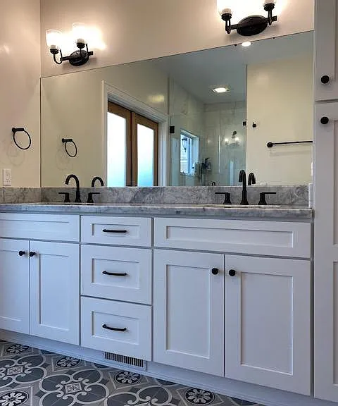 Master bathroom, double vanity sink, Carrara marble countertops and tons of storage.