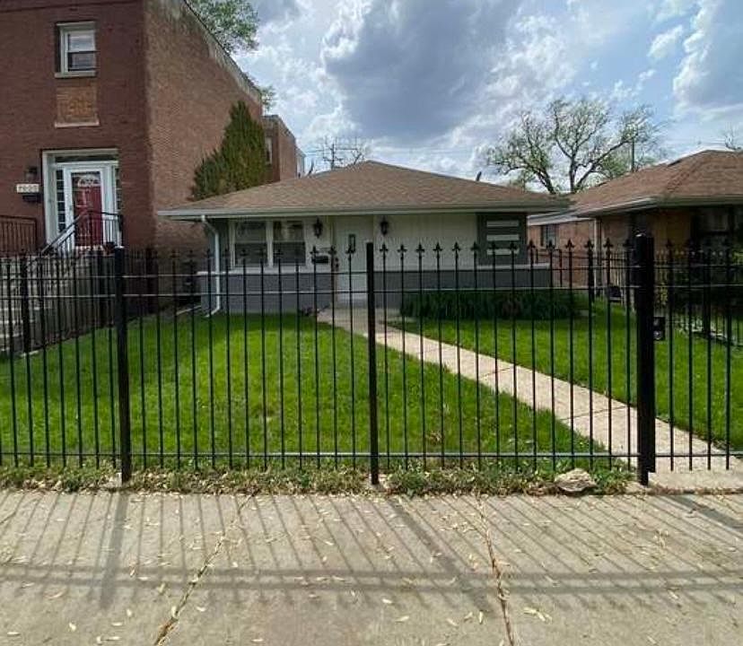 1st image of 7029 S Woodlawn Ave
