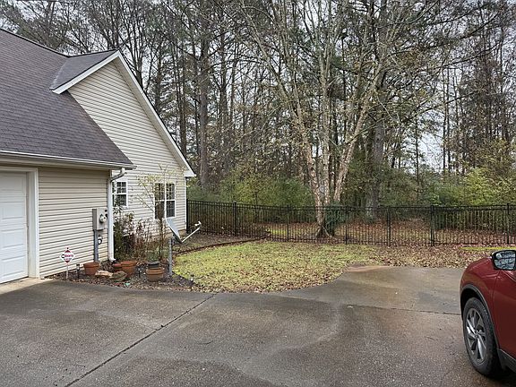2 car garage and fenced backyard
