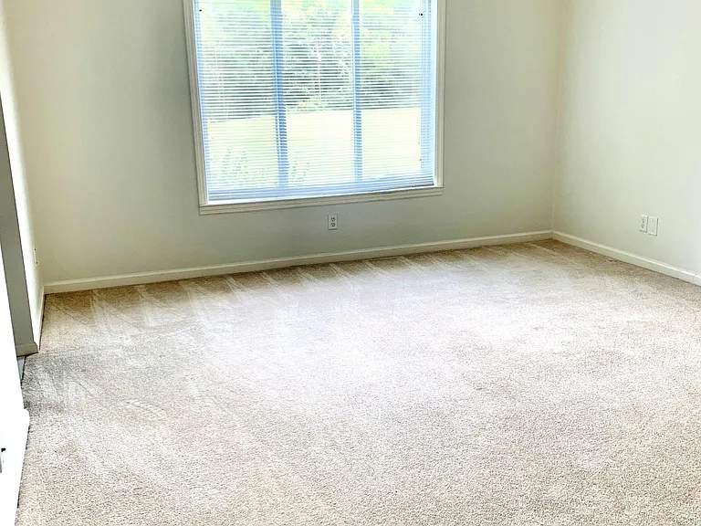 Wake up in this exceptional sized Master Bedroom, with peaceful views of nature in the back lawn.