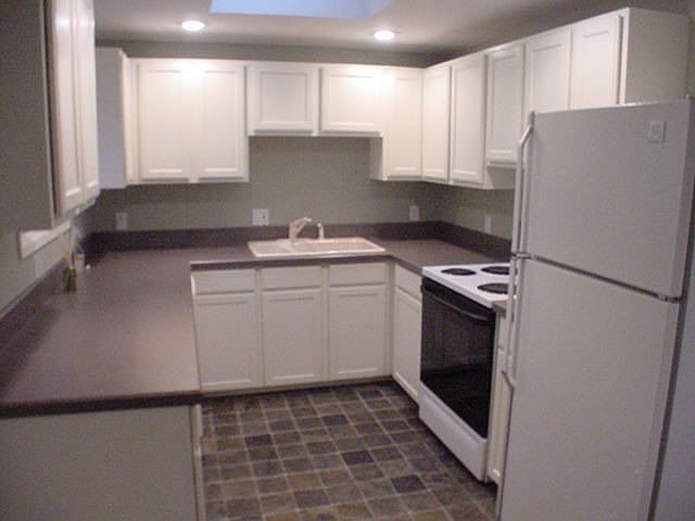 Updated kitchen, new appliances and slate floor.