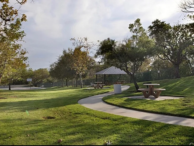 Park, playground, party shelter, and basketball court 1 block from home.