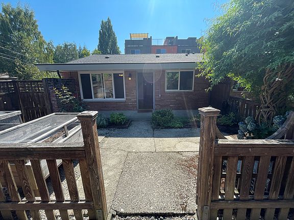 Unit exterior and private yard.