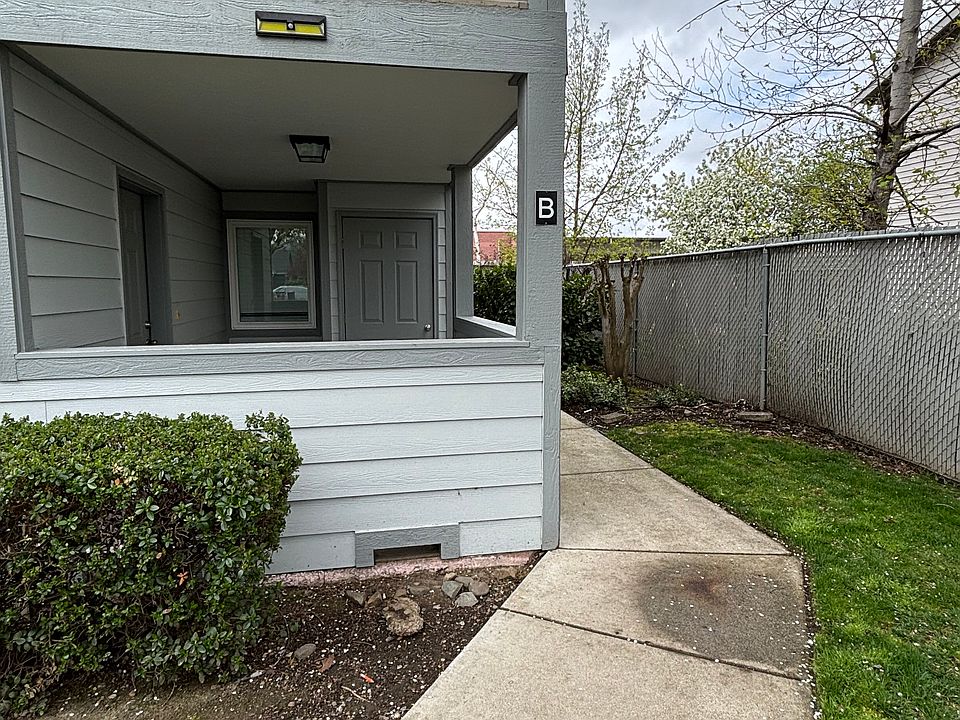 Covered, partially enclosed porch