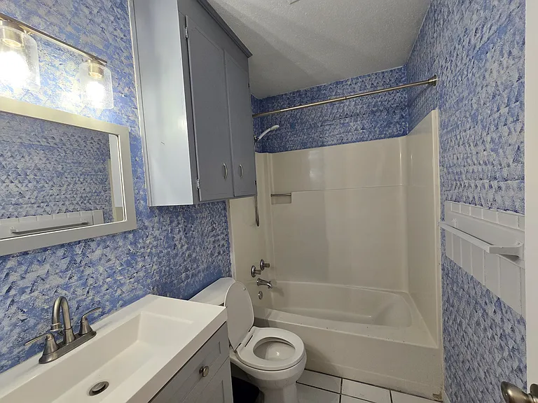 The sponge painted bathroom adds interest and a splash of fun!
