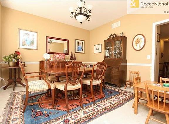 Formal Dining Room that leads to the kitchen.