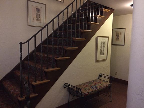 Building foyer with stairs to apartment.