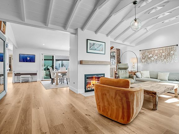 Open spacious floor plan living room, fireplace, dining room opens to private yard