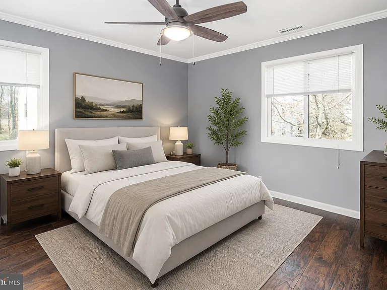 Minimalist bedroom with natural light - Staged