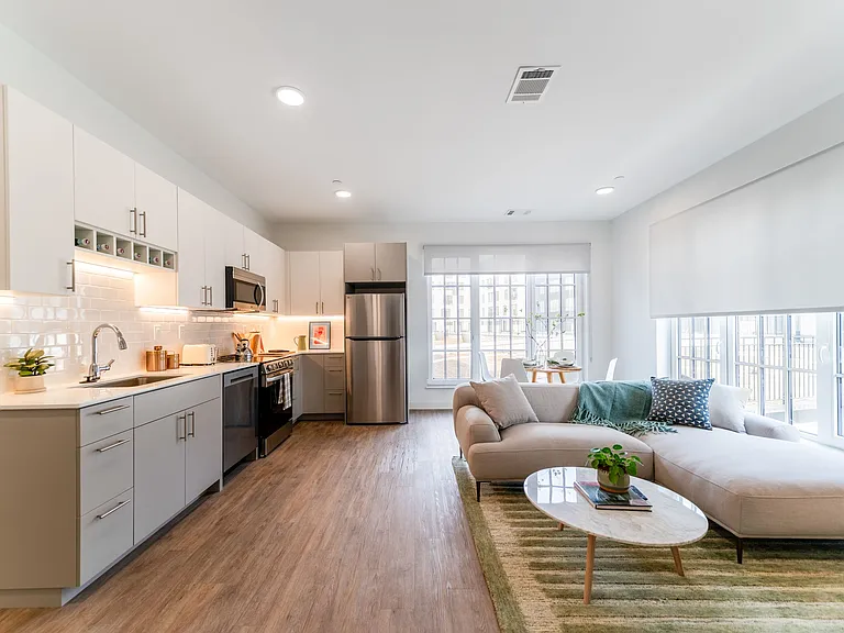 Model Living Room and Kitchen The Proof
