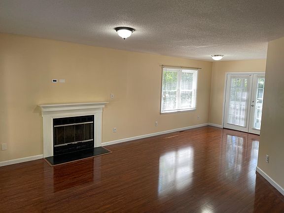 Living Room/Dining Room with Wood Burning Firplace