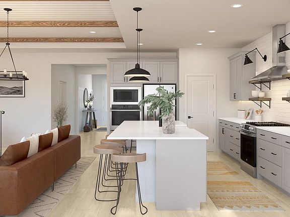 Kitchen with floating shelves and spacious island
