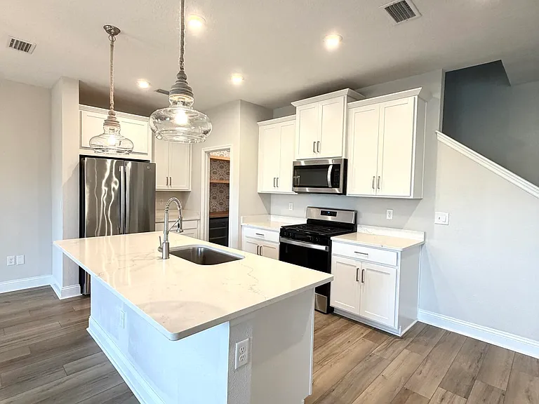 12959 Holsinger Blvd — Photo 2
