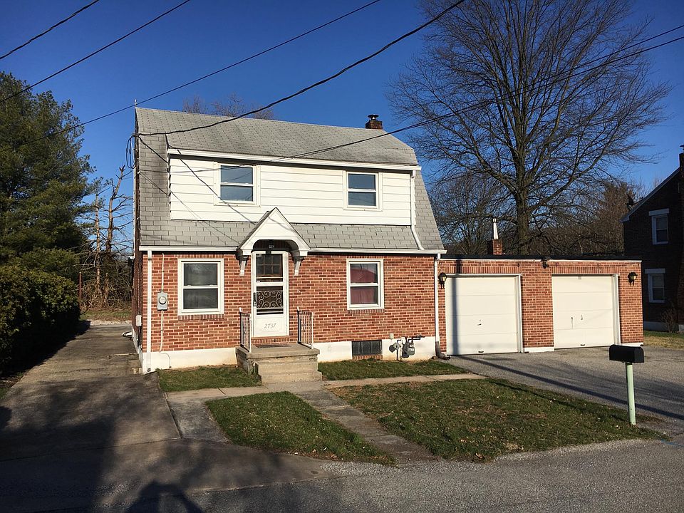 2 car garage, plus parking behind the house. Great neighborhood