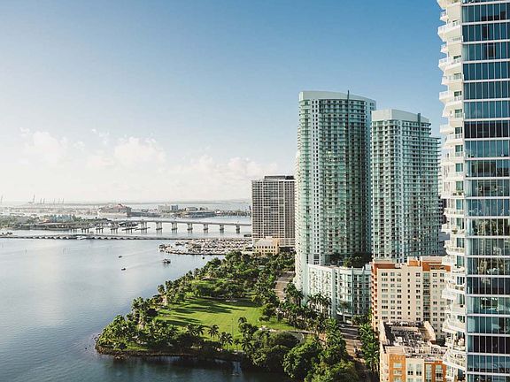 Enjoy stunning views from the rooftop and private balconies