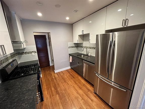 Stainless appliances, gas stove, dishwasher, garbage disposal.