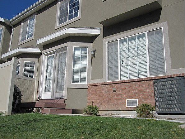 Backyard with small deck and BBQ area