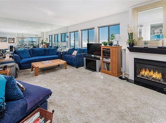 Spacious Living Room with Cozy Fireplace