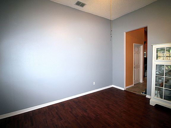 Laminate floors open to kitc