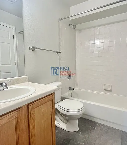 10784 W 63rd Pl #103 — Photo 12