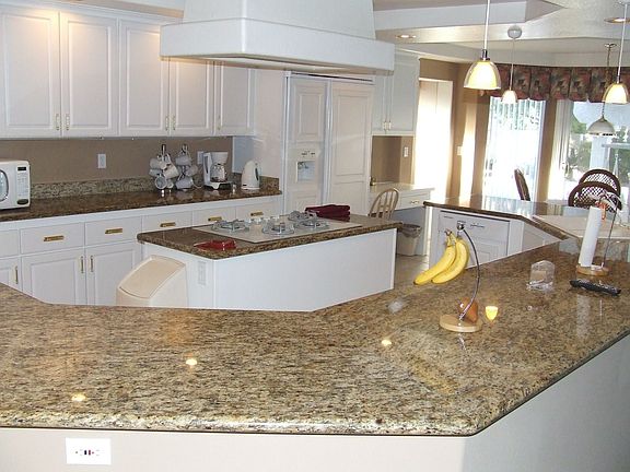 The spacious kitchen offers endless counter space.