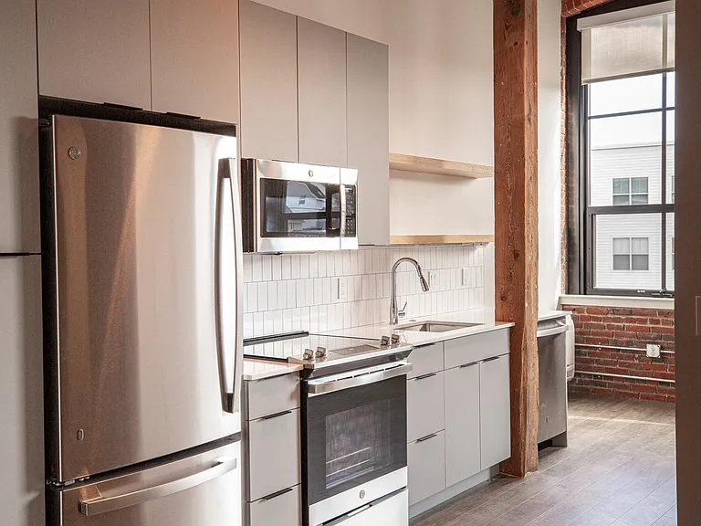 Stainless steel appliances and custom cabinetry