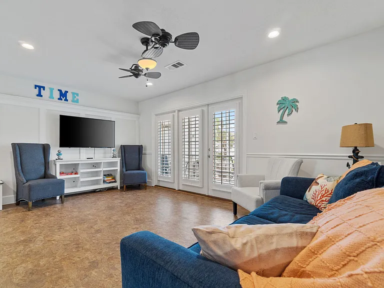 Spacious living room ideal for family game nights. Bring your logins and wind down for family movie nights with our Wi-Fi enabled TVs