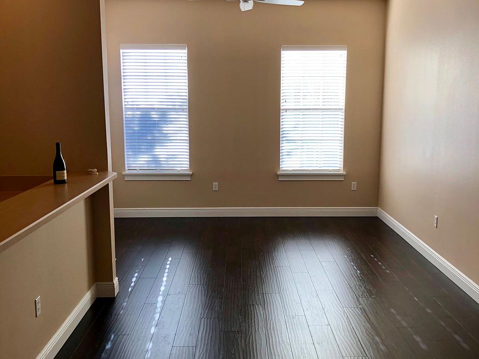 Large open space with high ceilings. Fan is remote control.