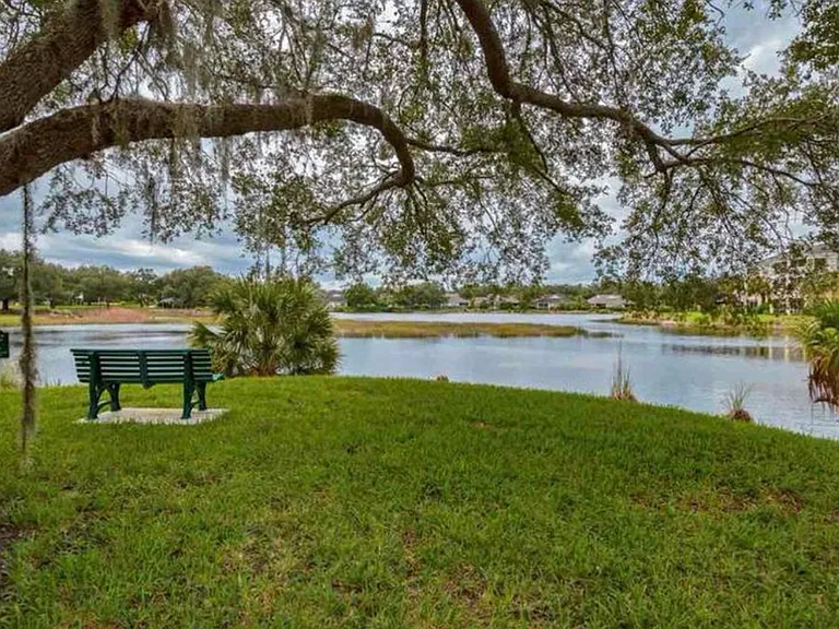 Walking trail with benches around the lake