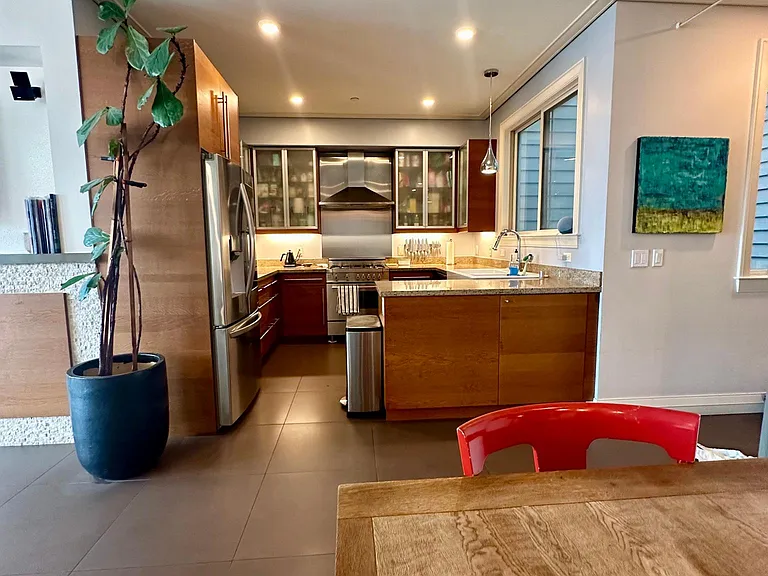 Open kitchen with Bertazzoni gas stove