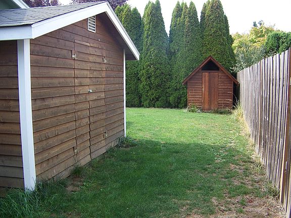 2 cedar storage sheds