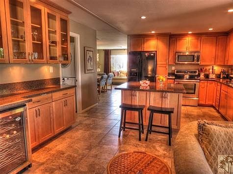 Completely remodeled kitchen with built in bar with wine cooler