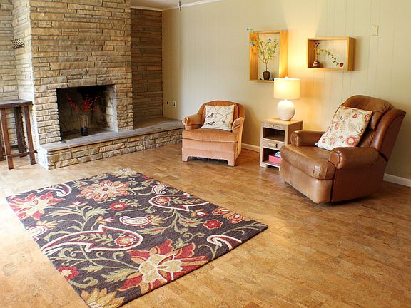 Den with fireplace gas logs