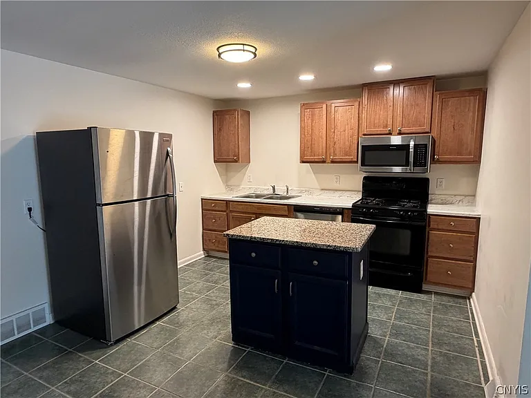 8587 Caughdenoy Rd — Photo 5